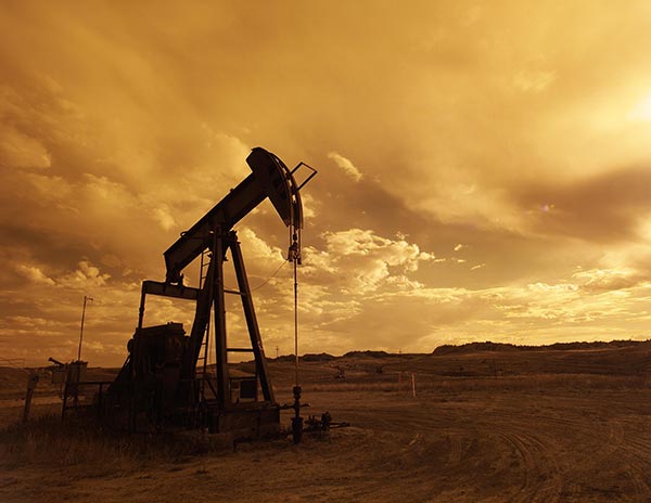 oil-pump-jack-sunset-clouds-silhouette.jpg