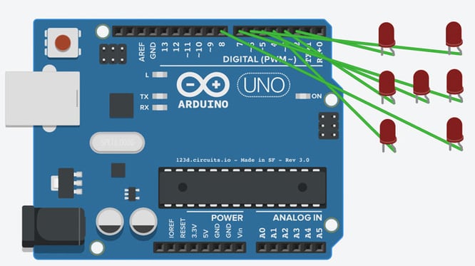Arduino Uno wiring diagram showing the connections of seven LEDs without the grounds.
