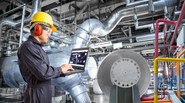 Engineer-using-laptop-computer-for-maintenance-in-thermal-power
