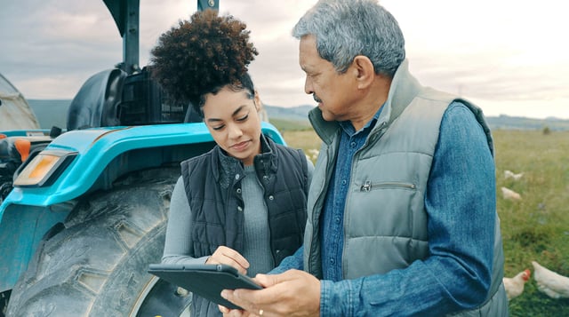 Shot-of-a-man-and-woman-using-a-digital-tablet-while-working-together-on-a-poultry-farm