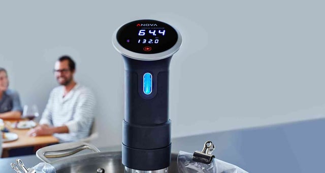 Anova Precision Cooker linked to a pot to make a sous vide machine.