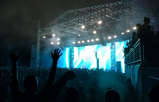 Music concert arena with a large crowd as an Internet of Things (IoT) Smart Arena example.