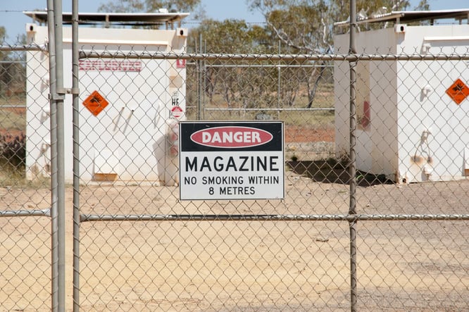 Danger sign on a fence