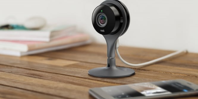 Nest Cam by Google on top of a desk.