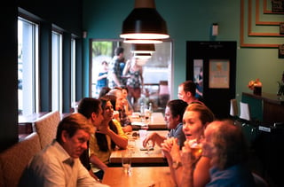 Customers enjoying food and drinks at a Smart Restaurant.