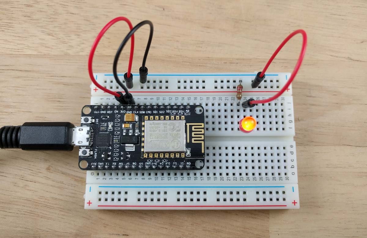 Breadboard with a microcontroller and LED.