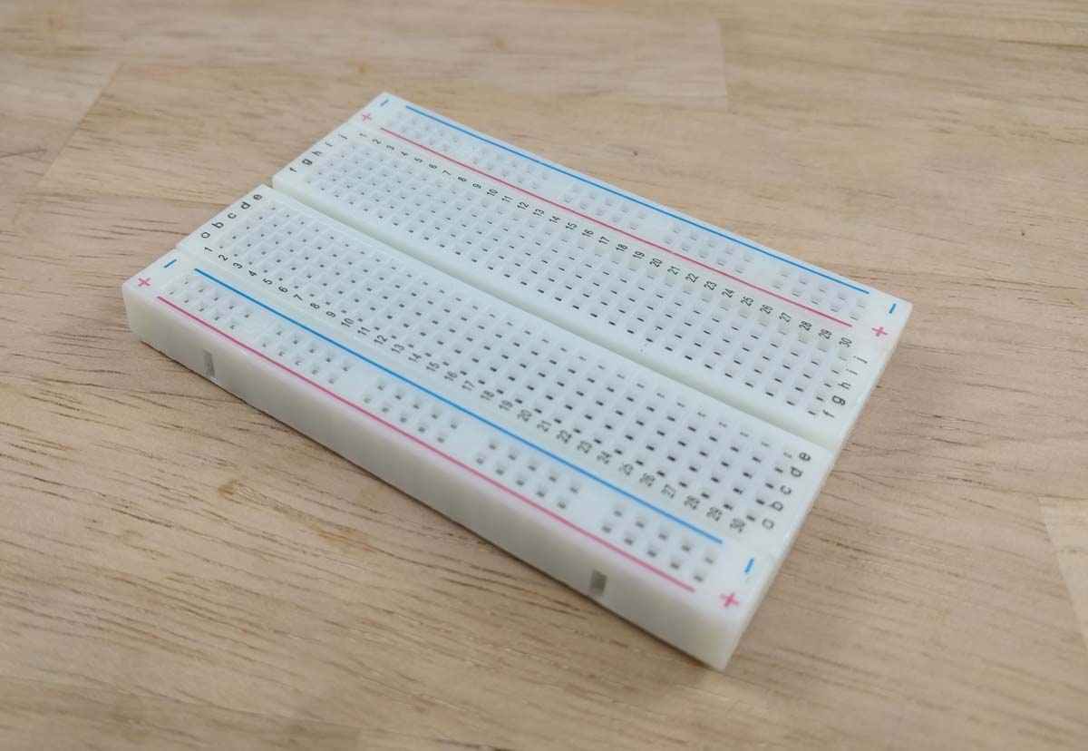White breadboard on a table.