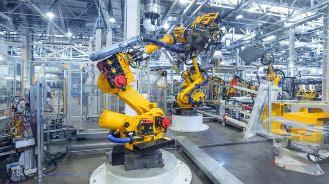 Robotic manufacturing machine in a plant environment.